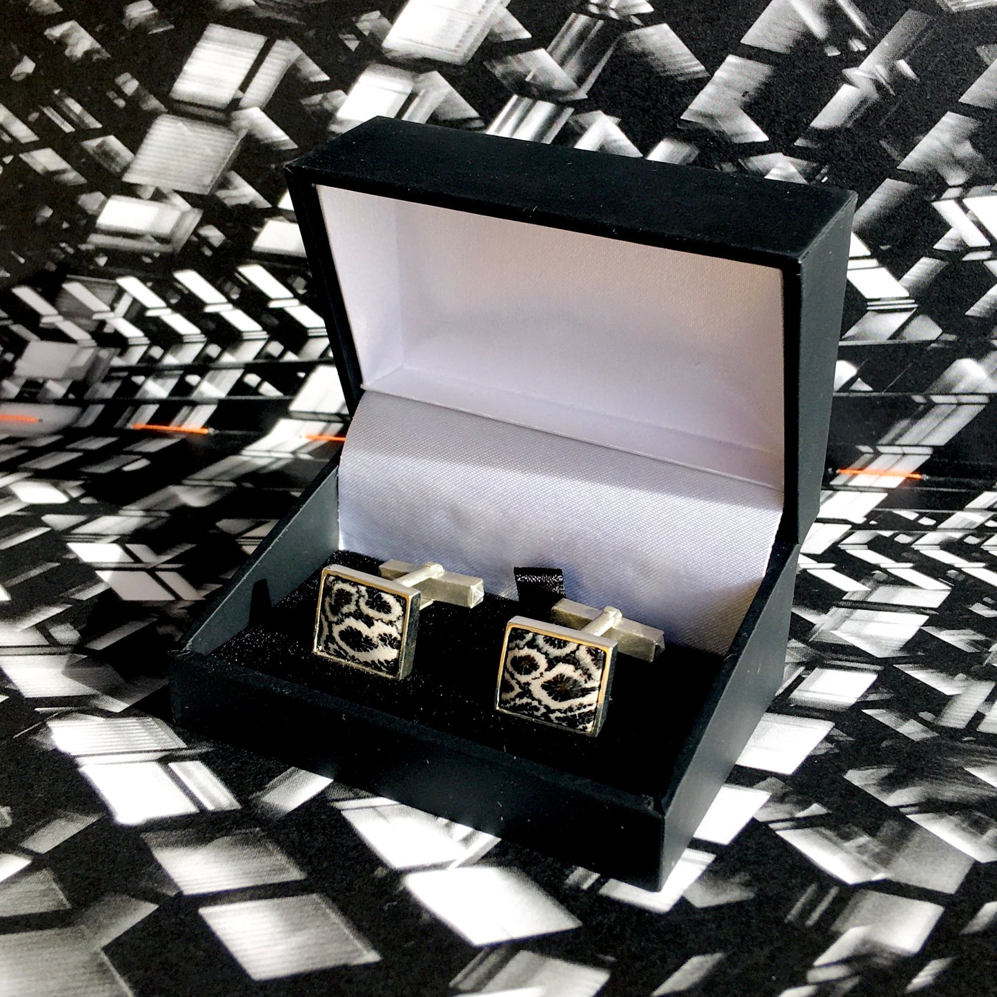 Brut. Silver cufflinks with fossilized coral